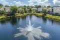 Fountain and pond townhouse community Royalty Free Stock Photo