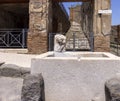 Fountain for public use on one of the streets of ancient city, Pompeii, Naples, Italy Royalty Free Stock Photo