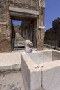 Fountain for public use on one of the streets of ancient city, Pompeii, Naples, Italy Royalty Free Stock Photo