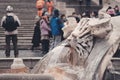 Fountain in Rome, Italy and group of Chinese tourists in the background Royalty Free Stock Photo