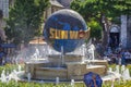 A fountain with a round ball that rotates around its axis, with the inscription - Sun World Ba Na Hills
