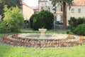 Fountain in round garden Royalty Free Stock Photo