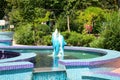 Fountain of rtech stone blue dolphins.