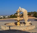 A fountain with a sculpture from Biblical history. Jonah and the fish