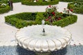 Fountain. Sparrow. Stone fountain full of water with a sparrow cooling off in the water in a park in Madrid on a clear day Royalty Free Stock Photo