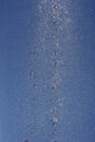 Fountain splashing against blue sky Royalty Free Stock Photo