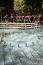 Waterworks fountain with water sprays and geysers in park or garden