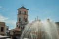 Fountain on a square in front of church at Merida