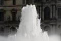 Fountain in the square in front of the Louvre