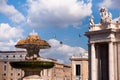 Fountain at St Peter square with pigeons in Vaticano Royalty Free Stock Photo