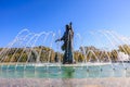 A fountain with a statue of a man in the middle. October 27, 2024 Chisinau Moldova Royalty Free Stock Photo