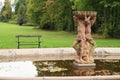 Fountain with statues in chateau park on Castle Sychrov Royalty Free Stock Photo