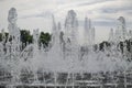 Fountain streams and splashes cloudy summer in the Park close-up