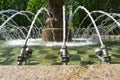 Fountain in the summer park, water jets close-up