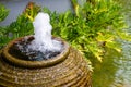 The fountain in a terracotta jar Royalty Free Stock Photo