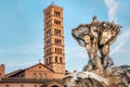 Fountain of Tritons and church Santa Maria in Cosmedin in Rome, Italy Royalty Free Stock Photo