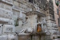 Fountain under the Torre della Pallata tower in Brescia, Lombardy, Italy