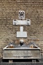 Fountain in Vatican wall, thin jet of water