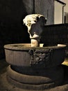 Fountain in Viterbo city, near Rome, Italy. Light and darkness, stone and water