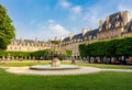 Fountain on Vosges square (Place des Vosges), Paris, France Royalty Free Stock Photo