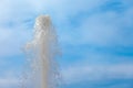 Fountain water jet close up on blue sky background Royalty Free Stock Photo