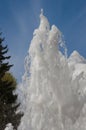 Fountain water jet close up on blue sky background Royalty Free Stock Photo