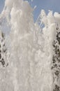 Fountain water jet close up on blue sky background Royalty Free Stock Photo