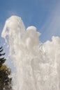 Fountain water jet close up on blue sky background Royalty Free Stock Photo