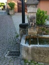 Fountain with water in old Montreux town Royalty Free Stock Photo