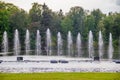 Fountain on the water. Water show. Fountain on the lake in the park