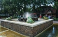Fountain with water spitting frogs in the fairytale forest in th Royalty Free Stock Photo