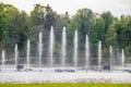 Fountain on the water. Water show. Fountain on the lake in the park