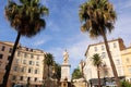 Fountain with a white marble historical monument in the city of Ajaccio in Corsica. France, September 2019