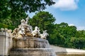 Fountain with white statues in Schonbrunn Imperial Palace and gardens