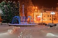 Fountain in the winter park at night Royalty Free Stock Photo