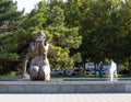 Fountain a woman holding water in her palms on the embankment of the city of Novorossiysk in summer