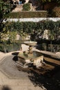 A fountain in the yard of the Alhambra castle in Granada, Andalucia, Spain