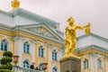 Fountains of Peterhof. View of Grand Palace, Golden statues of Grand Cascade and Samson Fountain at Peterhof Palace. Royalty Free Stock Photo