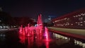 fountains, water at night in the city, red color