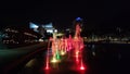 fountains, water at night in the city, red color
