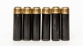 Four AA batteries isolated on white background for electronics and power needs Royalty Free Stock Photo