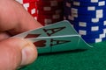 Four ace cards on the background of poker chips in a casino Royalty Free Stock Photo