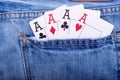 Four aces in blue jeans pocket Royalty Free Stock Photo