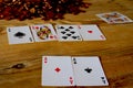 Four aces cards , poker on a wooden table . Royalty Free Stock Photo