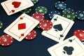 Four aces and chips, card game, cards on the table. Poker and blackjack Royalty Free Stock Photo