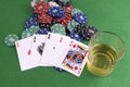 Four Aces on chips and and glass of whisky Royalty Free Stock Photo