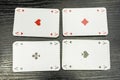 Four aces from the deck of playing cards.