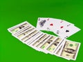Four aces and dice on green broadcloth . Royalty Free Stock Photo