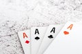 Four aces of different suits isolated on white background macro view Royalty Free Stock Photo