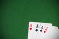 Four aces on green background. Gambling poker Royalty Free Stock Photo